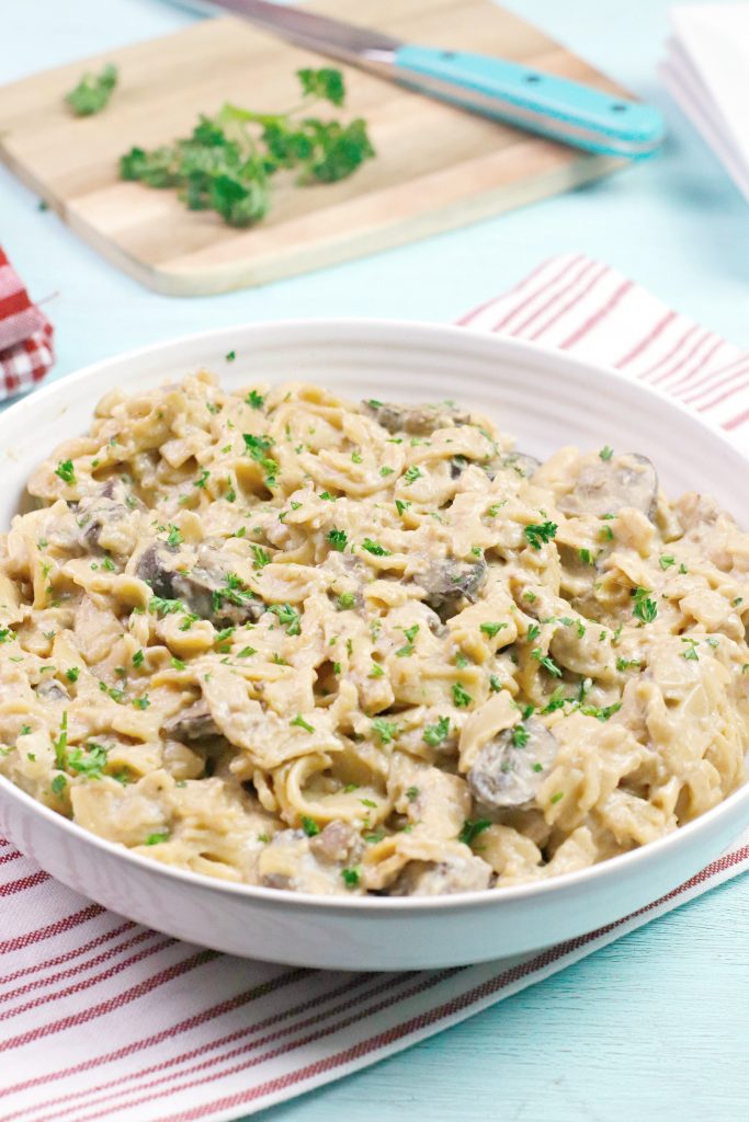 Instant pot beef stroganoff in a white bowl