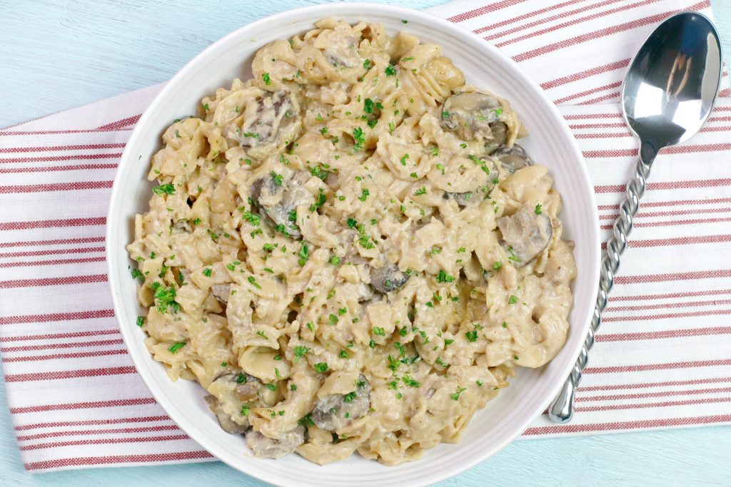 Instant Pot beef stroganoff in a white bowl