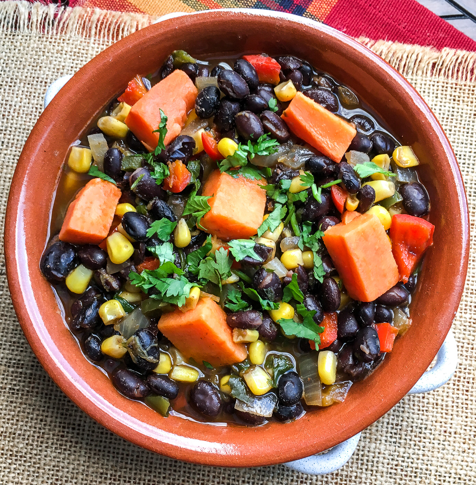 black bean and sweet potato soup in a bowl