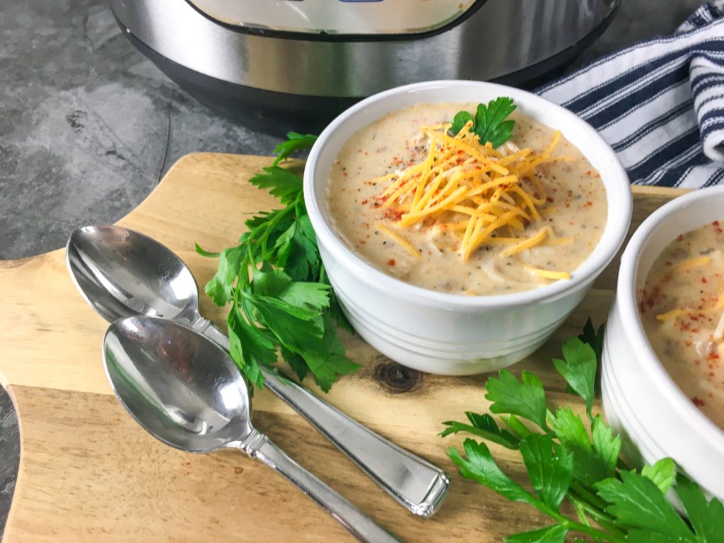 Instant Pot Cheeseburger Soup in a white bowl