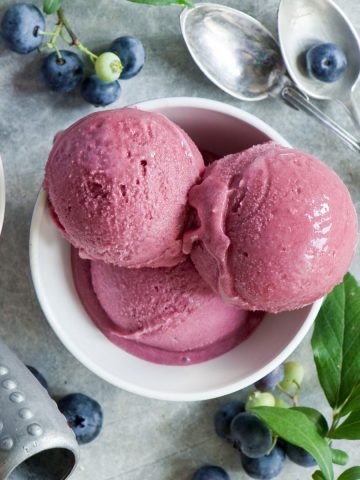 Berry ice cream in a white bowl