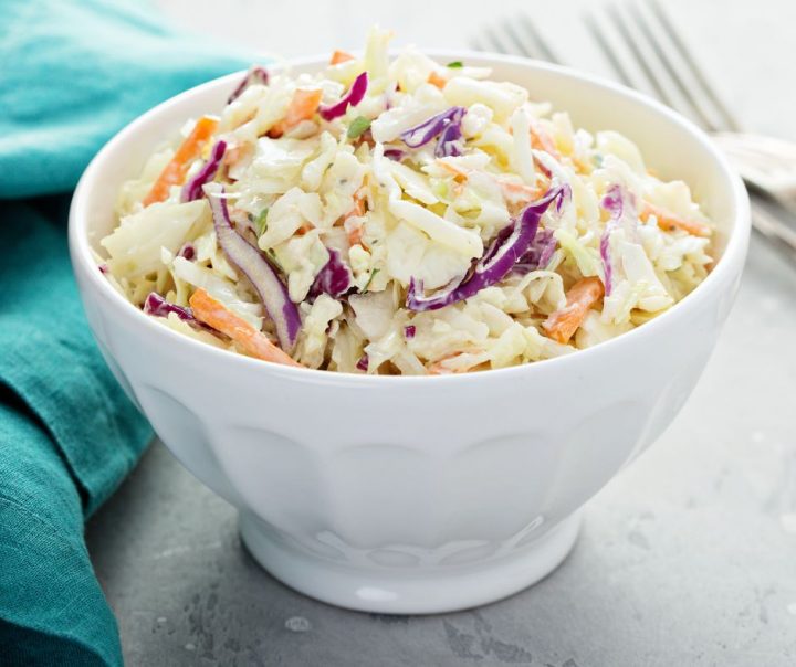 closeup of coleslaw in a white bowl