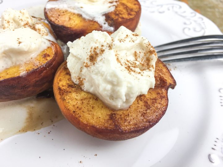 baked peaches with a fork on the side