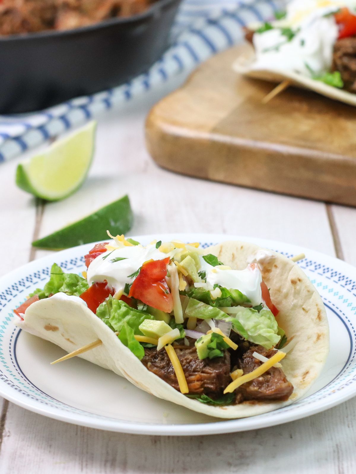 the best barbacoa taco on a white plate