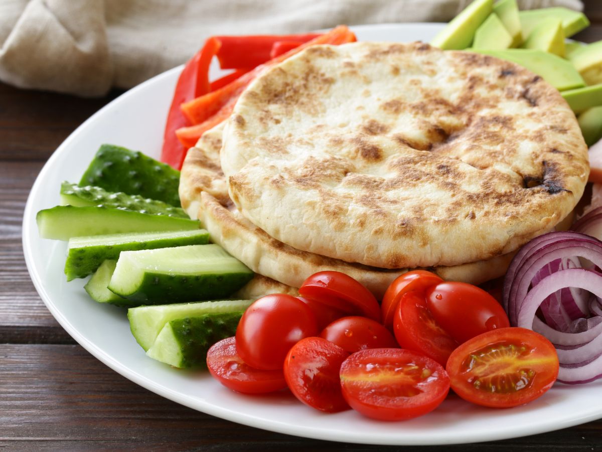 pita and veggies on a plate