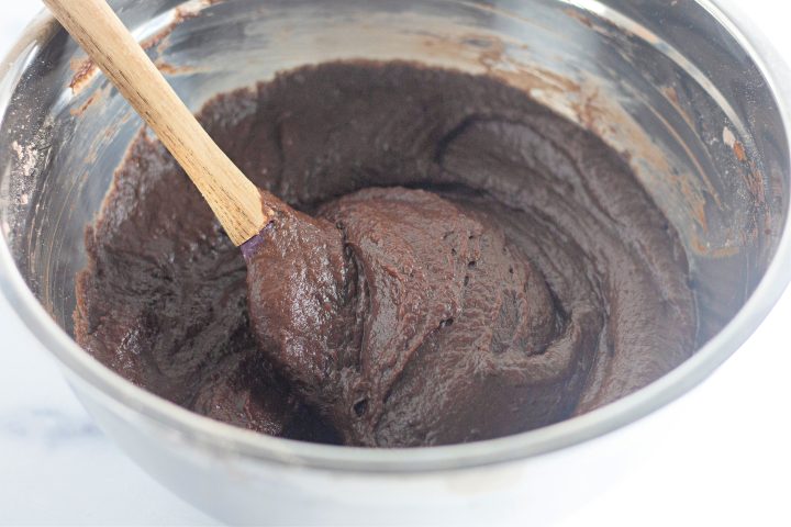 pumpkin brownie batter in a metal bowl