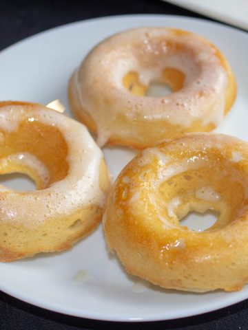 lemon donuts on a white plate