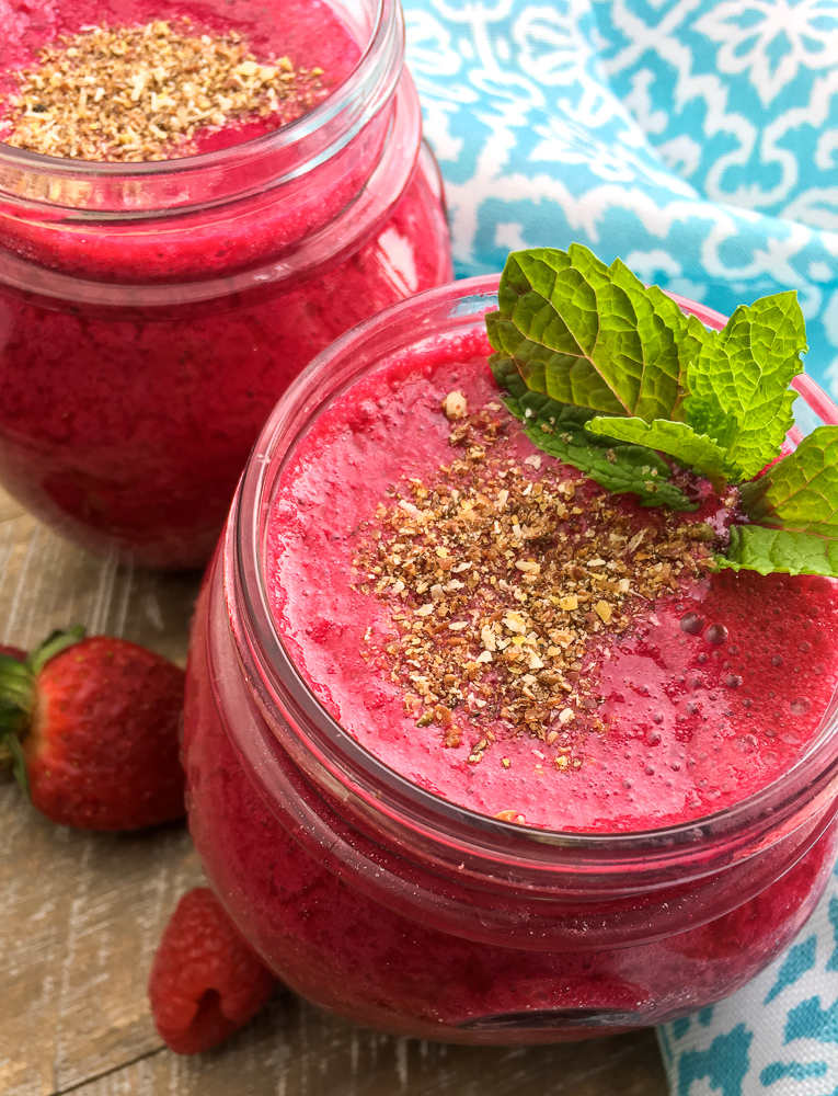 Beet and berries smoothie with seeds on top