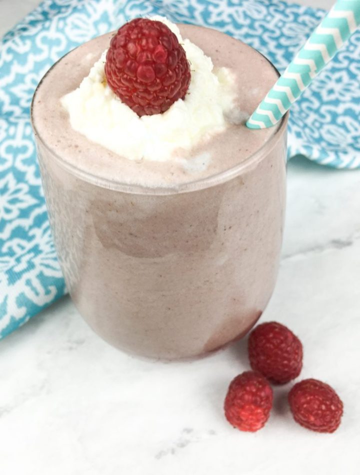 Raspberry Creamsicle Smoothie Recipe with raspberries on top