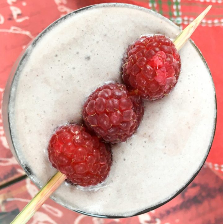 Raspberry Creamsicle Smoothie Recipe with raspberries on top