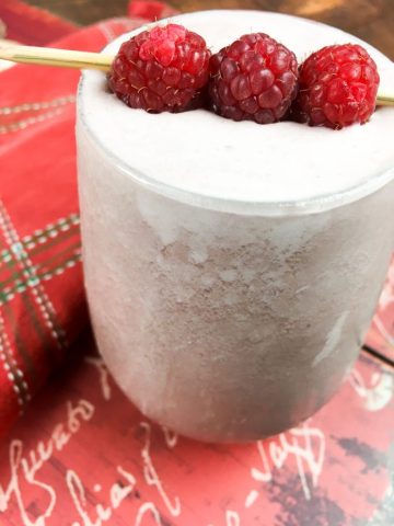 Raspberry Creamsicle Smoothie Recipe with raspberries on top