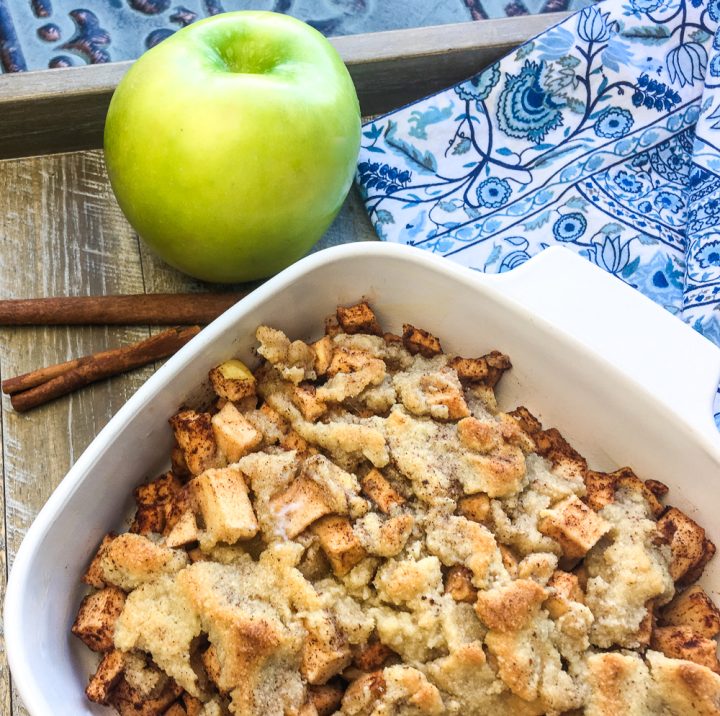 baked apples in a white dish