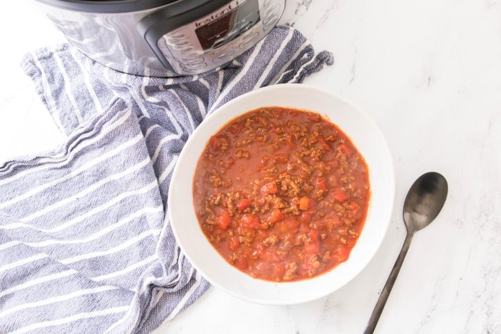 instant pot chili in a white bowl