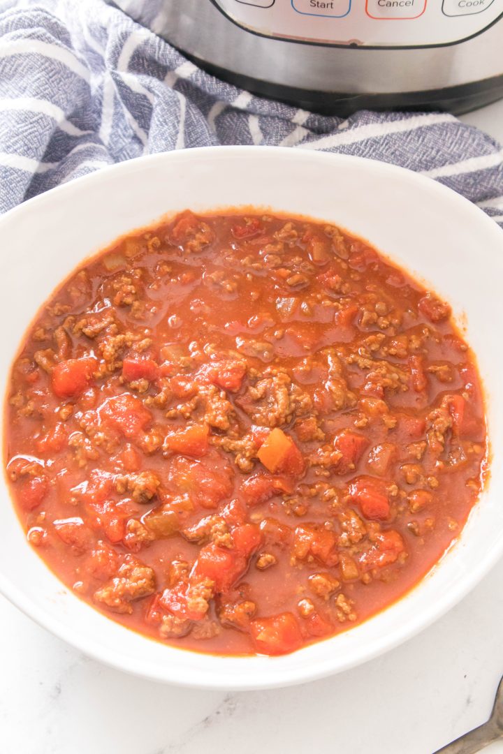 instant pot chili in a white bowl