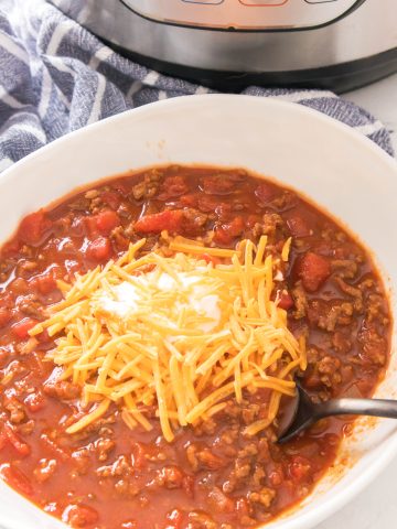 instant pot chili in a white bowl