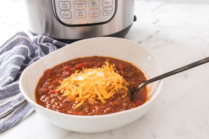 instant pot chili in a white bowl