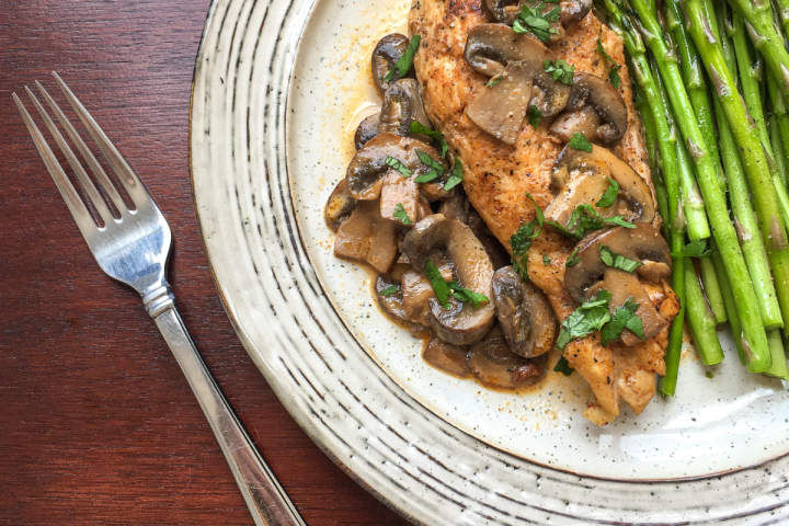 Chicken Lanzone on a white plate