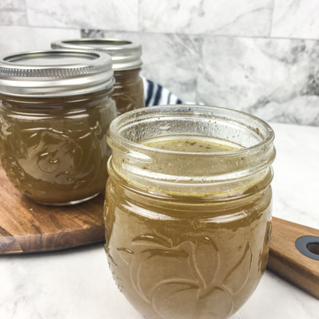 homemade chicken broth in a jar