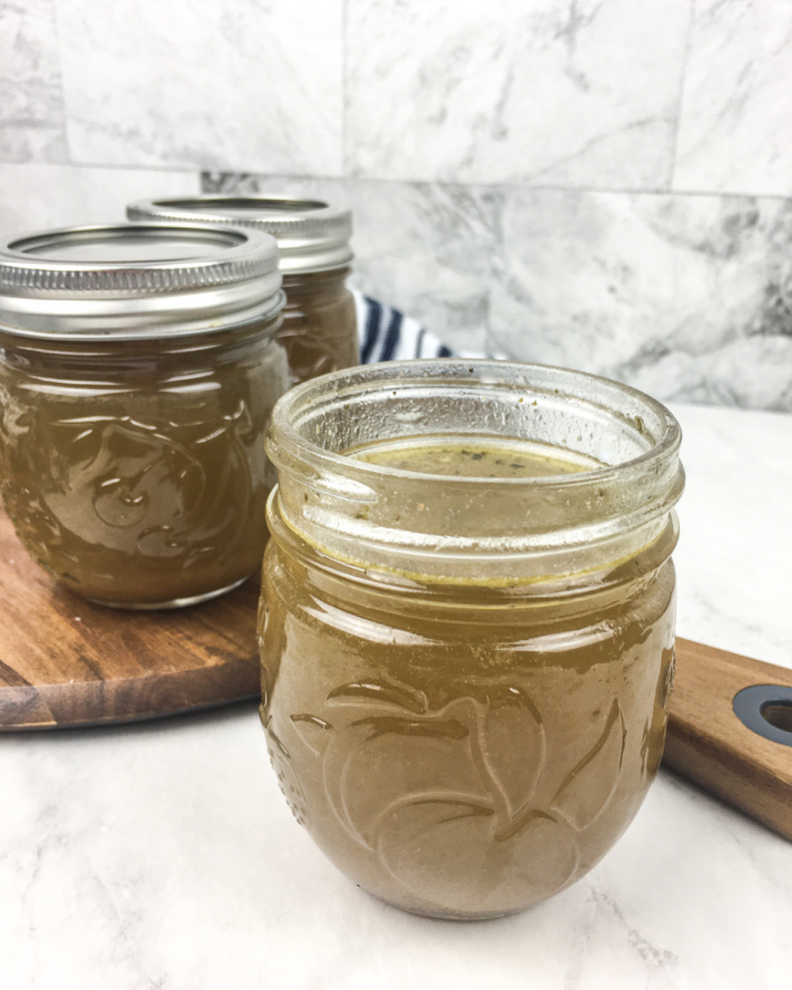homemade chicken broth in a jar