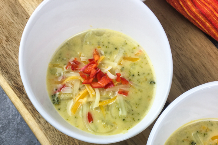 Instant Pot Broccoli Cheese Soup in a white bowl