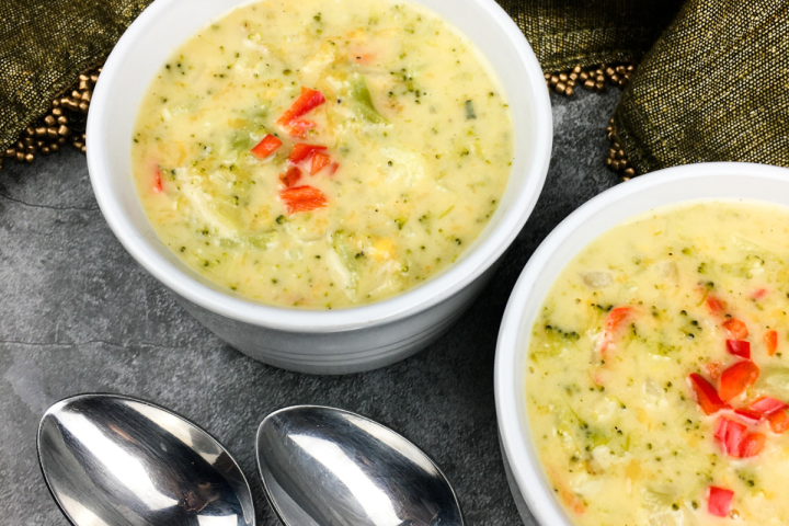 Instant Pot Broccoli Cheese Soup in a white bowl